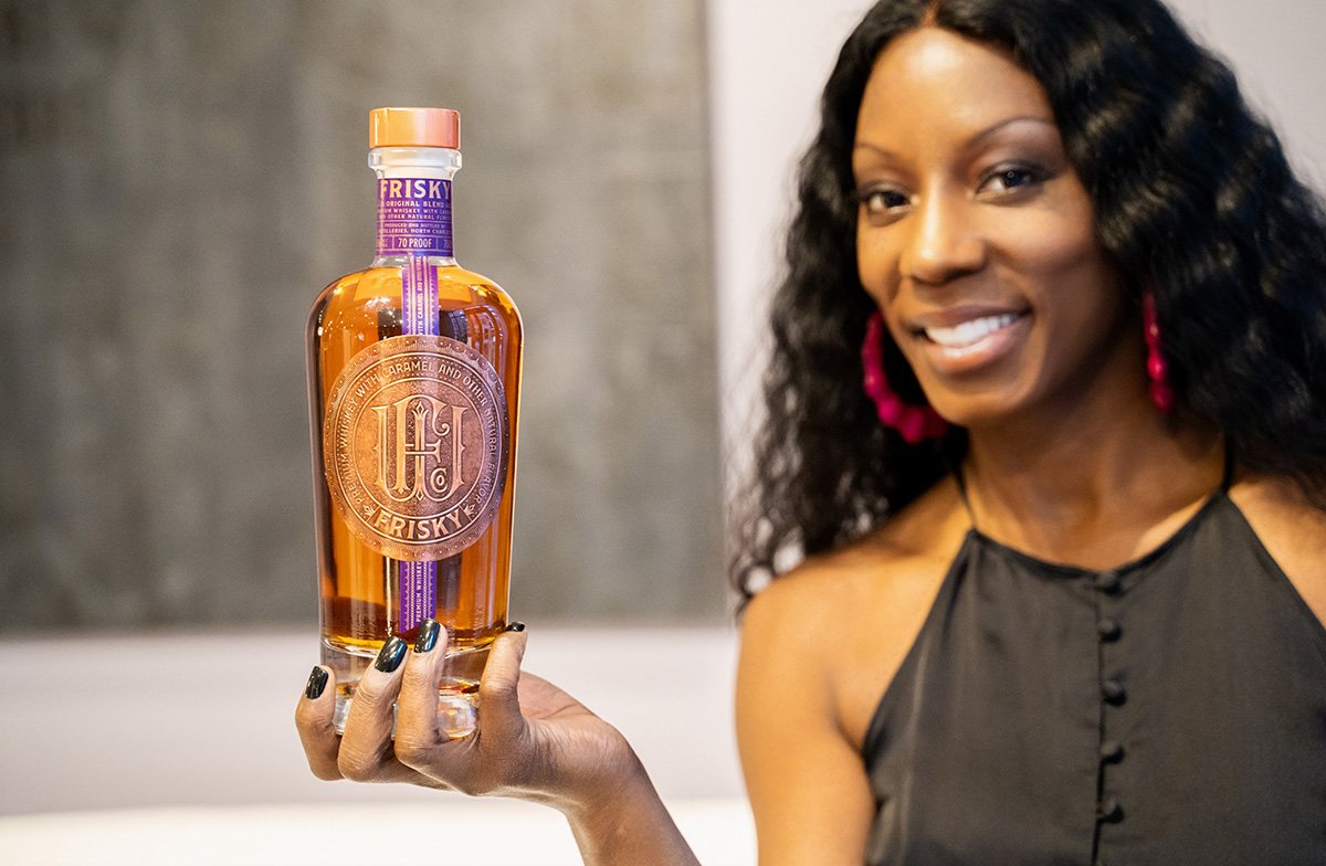 CEO Nicole Young and her prize-winning Irish whiskey. Photo by Eric Vitale